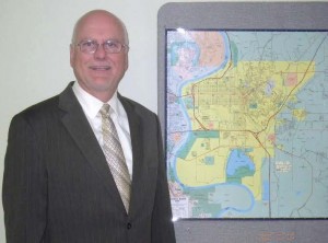 Council Bluffs, Iowa, Public Works Director Greg Reeder poses with a map of the city. (Photo provided)