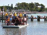 Riders from the fire department, and their mounts, are shuttled to Assateague Island to begin the annual Pony Penning. (Photo provided)