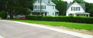 Dubuque, Iowa, located in the Bee Branch Watershed, is a floodprone area. Converting the city’s alleys to green surfaces reduced the volume of stormwater and increased the safe convergence of stormwater through the area. In this case, it also provided protection to the city’s water treatment plant. (Photo provided)