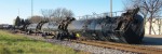 An overturned train near the tracks in Watertown, Wis.