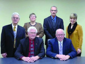 Manchester, Iowa, Mayor Milt Kramer and Mayor Pro-Tem Ron Struble pose with city council members. The council-manager form of local government was designed to combat corruption and unethical activity in local government by promoting effective management within a transparent, responsive and accountable structure.
