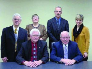 Manchester, Iowa, Mayor Milt Kramer and Mayor Pro-Tem Ron Struble pose with city council members. The council-manager form of local government was designed to combat corruption and unethical activity in local government by promoting effective management within a transparent, responsive and accountable structure. 