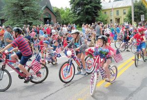 Children love to come out for the decorated bike portion of the parade.