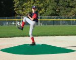 A young baseball player prepares to pitch on the True Pitch 202–6 Mound. True Pitch mound products are the only portable mounds approved by Little League for official game use. (Photo provided)