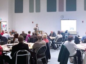 Chris Myres, economic development specialist with Sioux City, presents a MLA Part Three session in Cherokee, Iowa, on economic development. (Photo provided)