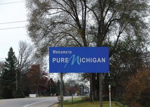 The sign welcoming visitors to the state of Michigan doesn’t give any indication of the woes some townships and counties have experienced due to the so-called “dark store strategy.” (Photo provided)