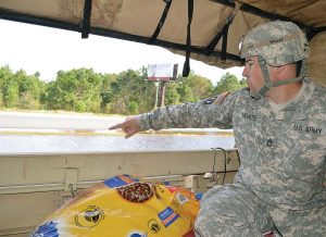 Army Sgt. 1st Class Timothy White surveys flood damage in Princeville, N.C., while on patrol with the North Carolina National Guard’s 514th Military Police Company on duty as part of the NCNG’s Reaction Force deployed to eastern North Carolina, Oct. 14, 2016. Princeville is still struggling to recover from Hurricane Matthew; however, many citizens have committed to rebuilding. (U.S. Army National Guard photo by Sgt. 1st Class Robert Jordan, North Carolina National Guard Public Affairs/Released)