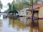 Princeville, N.C., was also impacted by Hurricane Floyd in 1999, pictured, with the resultant flooding of the Tar River forcing the evacuation of residents. (By Dave Saville/FEMA Photo Library via Wikimedia Commons)