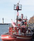 The addition of the tower ladder at the stern of the Edward M. Cotter fireboat helps to give a better vantage point to the firefighters. (Photo provided by the Edward M. Cotter Conservancy)