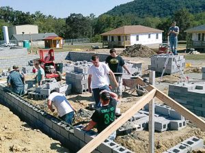 Students from Tazewell High School in Virginia work on a foundation. (Photo provided)