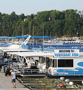 Houseboat Row, a unique feature of the annual National On Water Houseboat Expo on Lake Cumberland, allows expo attendees to rent aquatic accommodations during the three-day festival. (Photo provided)