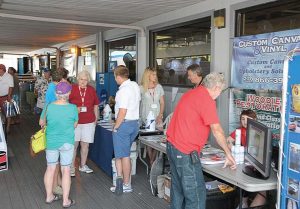 Dozens of vendors, including houseboat brokers, lenders, insurance agents and purveyors of accessories, attend the annual National On Water Houseboat Expo on Lake Cumberland. (Photo provided)