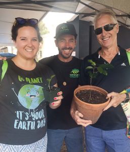 Members of Community Greening, a local nonprofit, hold saplings during Delray Beach’s Earth Day celebration. The nonprofit has worked with Delray Beach’s Parks and Recreation Department to help restore the city’s urban tree-canopy. (Photo provided)