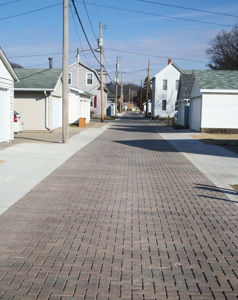 During a pilot program in Dubuque, Iowa, the city tried two different green alley options — porous asphalt and interlocking concrete pavers. The city collaborated with utility companies and chose to use the concrete pavers moving forward since it will be easier to correct future potential maintenance issues. (Photo provided by the city of Dubuque)