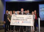 Huntington, W.Va., was announced as the grand prize winner on April 19 in Denver; its community leadership team was brought onto the stage to receive the ceremonial check for $3 million. (Photo provided)