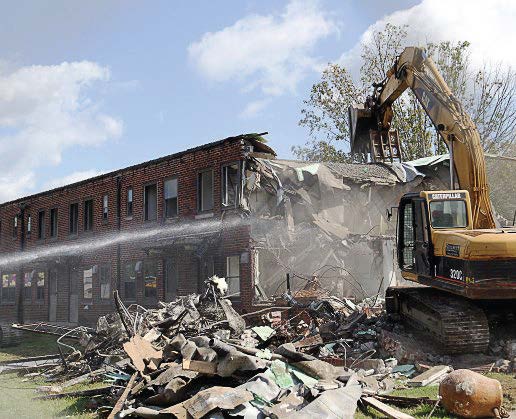 Northcott Court in the Fairfield West section of Huntington is demolished as part of its revitalization plan, which is designed to transform neighborhoods and blighted areas into hip hubs for innovative manufacturing, advancement training and healthy community improvements. (Photo provided)