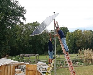 A small complete off-grid solar system was installed at the Buford Greenhouse at Buford Middle School in Charlottesville, Va. The system powers the greenhouse’s ventilation fans and small additional appliances. (Photo provided)