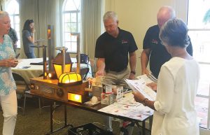 Vendors present sea turtle safe lighting at an educational session. Delray Beach sponsors educational outreach on sustainability topics year-round. (Photo provided)