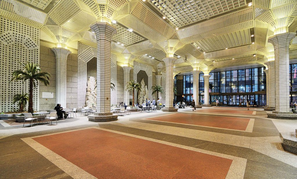 Within 60 Wall St Atrium in New York City, there is a 2,360-square-foot pedestrian arcade, which is a privately owned public space completed in 1989. The concept of POPS started in New York City, with plazas and arcades in the early ’60s. (Shutterstock.com)