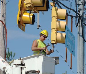 A Cranberry Township employee works on a traffic light. (Photo provided)
