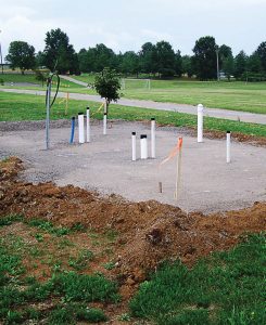 Sewer pipes, water lines and electrical lines needed to be installed prior to the installation of the prefabricated restrooms. The city of Perryville, Mo., is installing these restrooms to cut down on instances of vandalism. (Photo by Keith Riney)