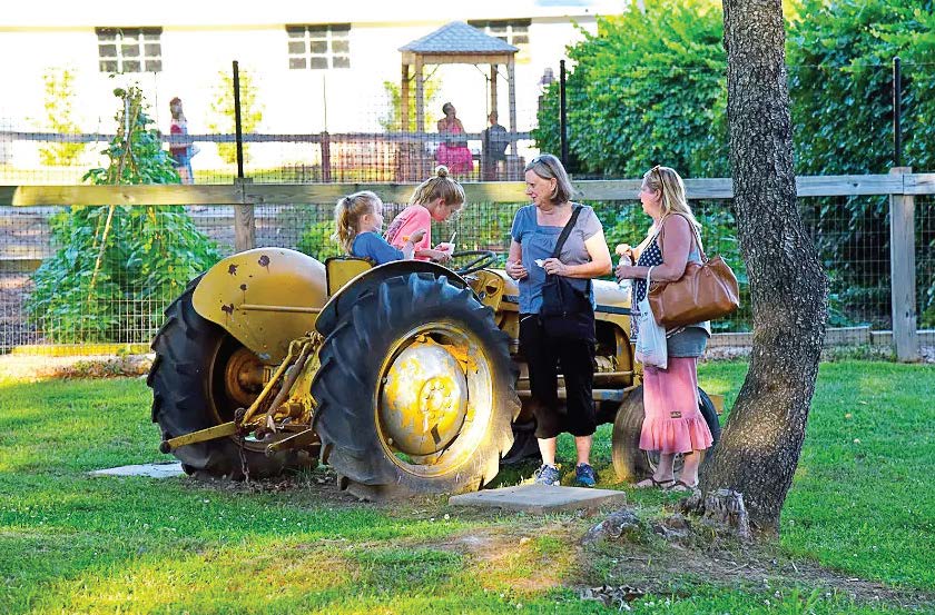 Young Farm Park visitors test the view from a tractor. (Photo provided by Germantown Parks and Recreation)