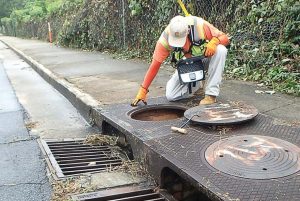 A worker inspects a manhole. Knowing more about the assets within their current wastewater system can allow cities to provide a high level of service, safety and protection for their communities. (Photo provided)