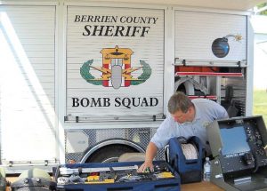 A member of the Berrien County Sheriff’s Office’s bomb squad shows off equipment ready for use if needed. (Photo provided)