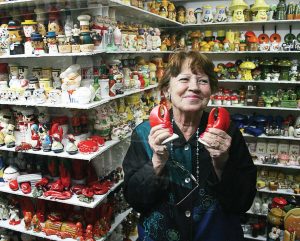 The late Andrea Ludden, cofounder and curator of the Salt and Pepper Shaker Museum, displays one of the more than 20,000 unique sets of salt and pepper shakers at her museum in Gatlinburg, Tenn. (Photo provided)