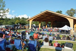 Residents of Johns Creek enjoy a summer concert. Since its incorporation, Johns Creek has doubled its city park system. (Photo provided)