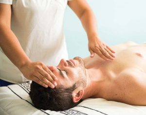 Reiki healing is gaining in popularity, and some police officers are taking part. This style of healing and therapy involves a healer realigning the body’s chakras in order to promote balance. (Shutterstock photo)