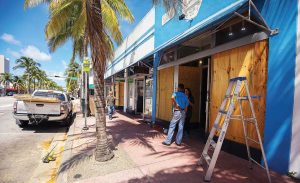 While agencies might seek out local sources, disasters might render local businesses unable to fulfill needs. In such cases, larger companies, with a national footprints, could bring in resources from other regions. Pictured are stores in Miami boarding up in preparation for Hurricane Irma. (Shutterstock.com)