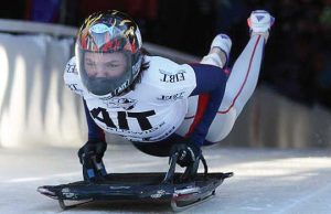 Lea Ann Parsley takes off on her skeleton sled during a past sporting event. Her career as a firefighter helped improve her physical fitness level while her pursuits as an athlete also benefited her firefighting. (Photo provided)