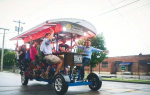 Chattanooga offers a vibrant downtown scene that draws millennials. Pictured is Pints and Pedals — the original and ultimate bike pedal tour bar crawl. (Photo provided)