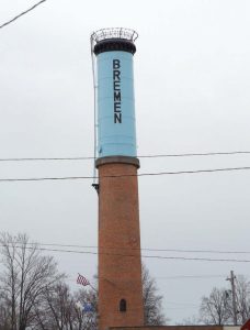 This smokestack identifying Bremen, Ind., can be seen for miles. The town’s head mechanic oft en uses resurfacing to keep his town’s vehicles in top shape so they can be used several years longer. (Photo by Denise Fedorow)