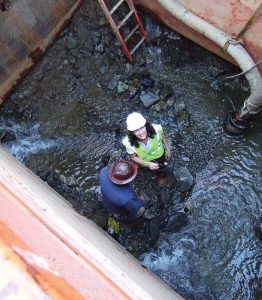 Danelle Murray isn’t afraid to literally get down in the trenches as a part of her career as an engineer. Murray was recognized by the American Public Works Association in part for leading innovations in water system modeling, stormwater modeling and the promotion of sustainable infrastructure. (Photo provided)