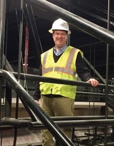 Mayor Rusty Paul checks out construction work at the new city hall. The project wrapped up on schedule and within the city’s budget. (Photo provided)