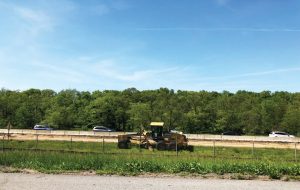 The creation of warm mix asphalt has expanded the road construction season, aiding in the maintenance of the interstate highway system. (Photo by Andrew Mentock)