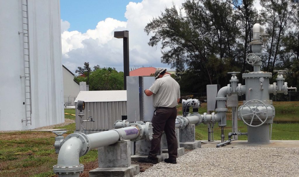 Pictured is Naples’ ASR well No. 1 at the wastewater treatment plant. The purple arrows on the pipes indicate that gray water is being transmitted through the line. (Photo provided)