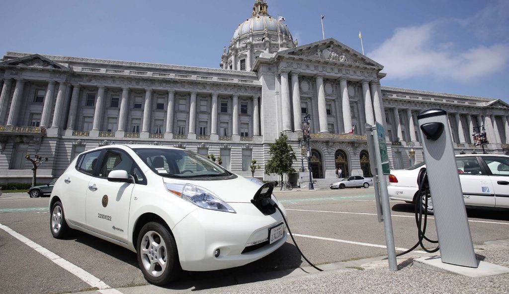 To successfully launch an electric vehicle pilot program, cities need to critically look at their fleets to determine what segment of it is ripe for electrification. Going hand-in-hand with that is having an infrastructure plan in place that accurately gauges future electricity needs. Pictured is one of the EV charging stations that line the perimeter of San Francisco’s city hall. (Dan Schreiber/ Shutterstock.com)