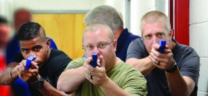 In addition to a hazardous material drill, Kosciusko County agencies participated in the Advanced Law Enforcement Rapid Response Tactics program to learn strategies for combatting active shooters. From left are Samuel Fowler, Winona Lake Police Department; Ryan Reed, Kosciusko County Sheriff’s Department; and Shawn Kantenwein, Winona Lake Police Department while Winona Lake Police Chief Joe Hawn guards the rear of the formation. (Photo by Phil Smith/Ink Free News)