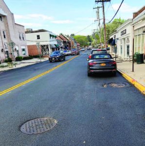Cars line Chappaqua’s newly paved South Greeley Avenue, located in the hamlet’s downtown area.