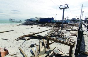 Hurricane Sandy hit the New Jersey Shore hard and devastated coastal towns like Seaside Heights. The boardwalk and amusements were destroyed, as shown in this photo, with sections of one of the iconic roller coasters sitting in the Atlantic Ocean. (Photo provided)