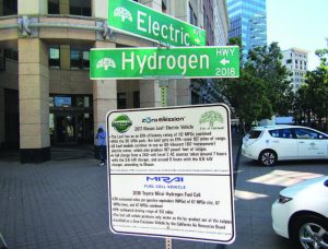 A sign educates citizens on Oakland’s electric and hydrogen vehicle programs. (Photo provided)