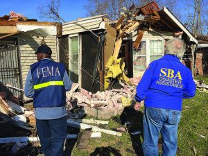 Teams of representatives from the Federal Emergency Management Agency, Small Business Administration and state of Louisiana survey the damage from a tornado in New Orleans in February of 2017. Once disasters like this happen, it’s important to document all expenses in order to be reimbursed and to pass a federal audit. (Photo provided)