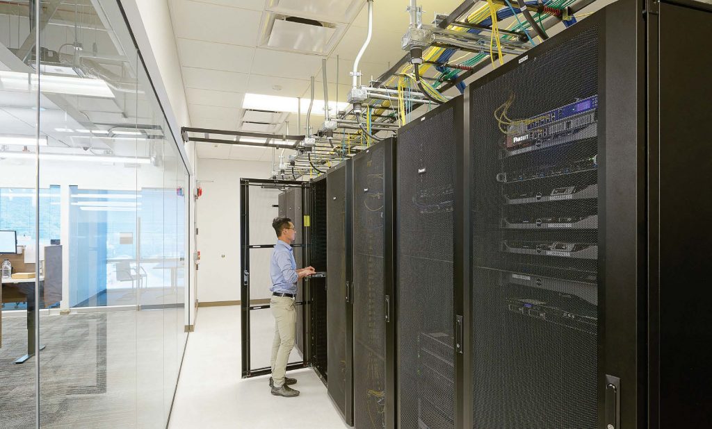 A Sandy Springs, Ga., IT staff member visits the server room. Sandy Springs outsources its IT work but the staff works onsite. (Photo provided)