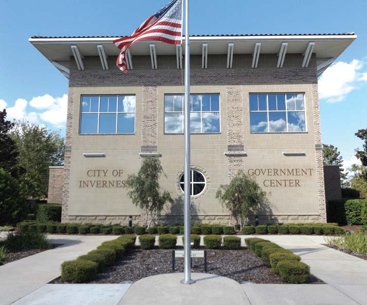 Inverness, under the leadership of City Manager Frank DiGiovanni, has invested in its downtown and launched a new capital improvement project in November. Pictured is the city’s government center and city hall. (Photo by Denise Fedorow)