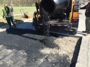 By removing debris and moisture from the repaired area, workers will ensure that the new material will better bond with the repair area. Picking the right material and allowing for proper compaction also play major roles in a successful repair job. (Photo provided)