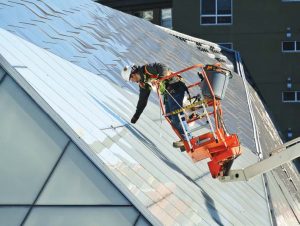 Screening walls angle inward to lower Denny Substation’s visual profile and are finished with an attractive combination of metal cladding and glass panels. (Photo provided)