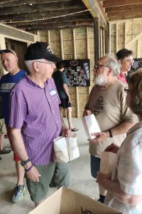 Residents enjoyed popcorn while learning more about the renovation process at King Theatre during the Heritage Days open house. (Photo provided)